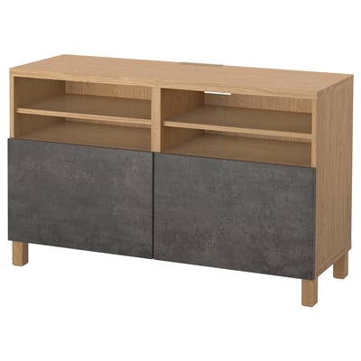 BESTÅ oak tv bench with 3 open shelves and 2 gray doors, modern and sleek.
