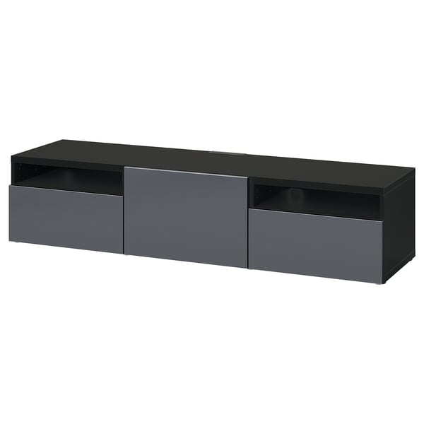 Modern black BESTÅ tv stand with sleek drawers and open shelves for storage and cable management.