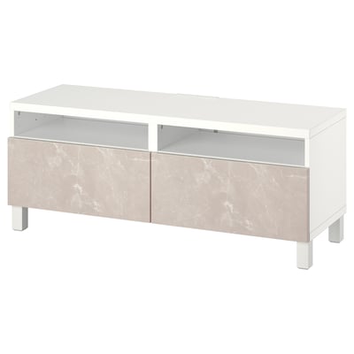 An ikea BESTÅ tv bench in white with marble-effect drawers. It open shelves and cable management.