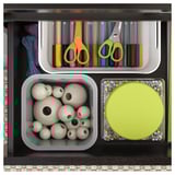 Craft supplies: top shelf with markers, scissors, strings, bottom left with wooden beads, right with colorful beads in green.