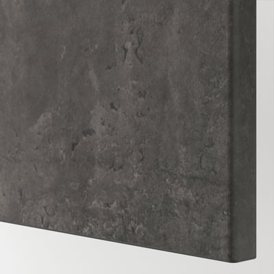 Dark gray textured panel close-up, showing smooth edge and fine details.