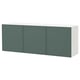 A white and green BESTÅ cabinet with three doors.