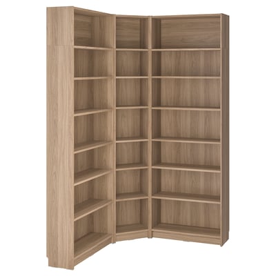 BILLY corner bookcase: light wooden finish, tall with multiple shelves, space-efficient design.