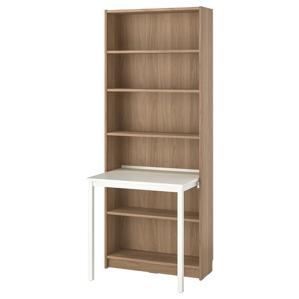 BILLY bookcase and desk combo in oak. Tall, slim design with multiple shelves and a pull-out white desk.