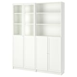 White BILLY bookcase with glass doors, rectangular shape, standard design.