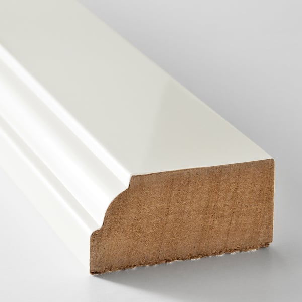 A high-quality, smooth, off-white fiberboard trim with a beveled edge.