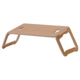 A BRÄDA laptop stand made of bamboo veneer, designed to tilt for comfortable viewing, folding flat for easy storage.