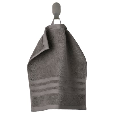 Gray BROKGLIM organic cotton towel on hook with woven border.