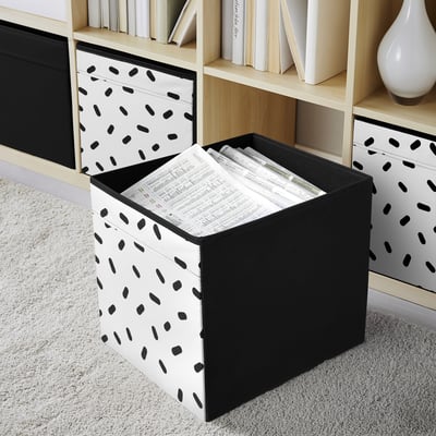 DRÖNA: black&white box in fabric on shelf, stores papers, sized for kallax shelving.
