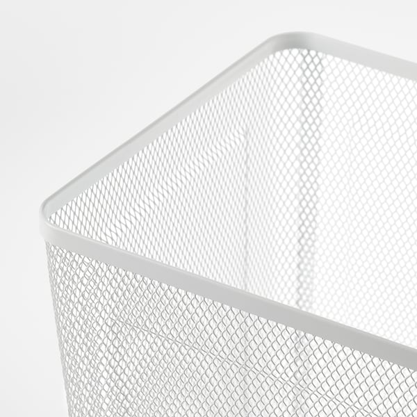 Close-up of a white mesh wastebasket. Sturdy metal construction and smooth, rounded edges.
