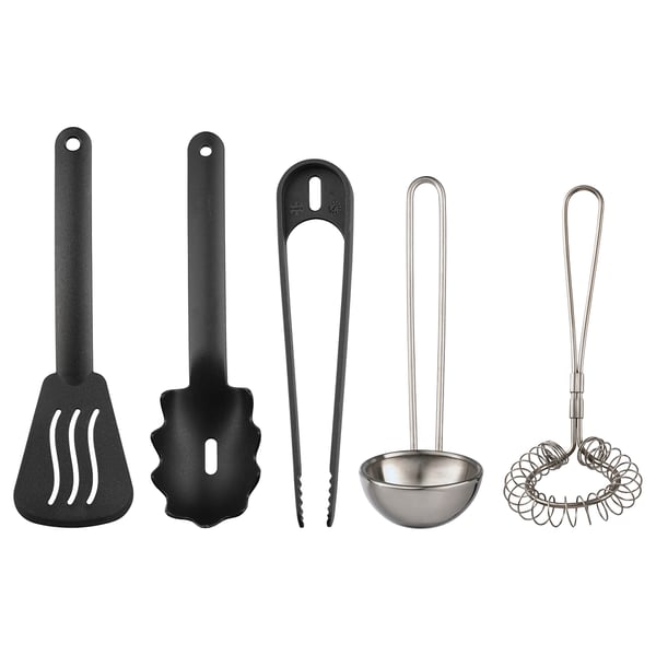 Five-kitchen utensils displayed: two black spatulas, black tongs, steel ladle, metal whisk.