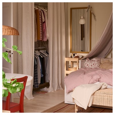 White linen curtains, simple and elegant, with heading tape for easy hanging.