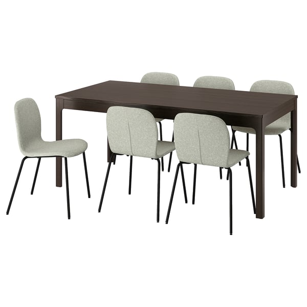 An EKEDALEN dark brown rectangular extendable dining table with four light green cushioned chairs.
