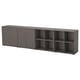This image shows an ikea EKET storage unit in dark grey. It both open shelving and closed cabinets for flexible storage.