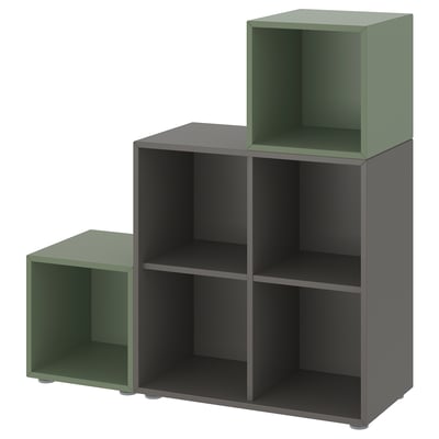 EKET bookshelf, black & green, modular, square-shaped storage units.