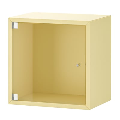 A yellow EKET storage unit with a glass door. Its square-shaped and made from fibreboard and particleboard with metal and glass details.