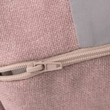 Close-up of well-crafted pink fabric bag with smooth, sturdy zipper.