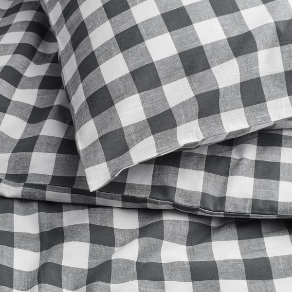 Gingham duvet cover, made of 100% organic cotton, neatly folded showcasing crisp check pattern in anthracite and white.