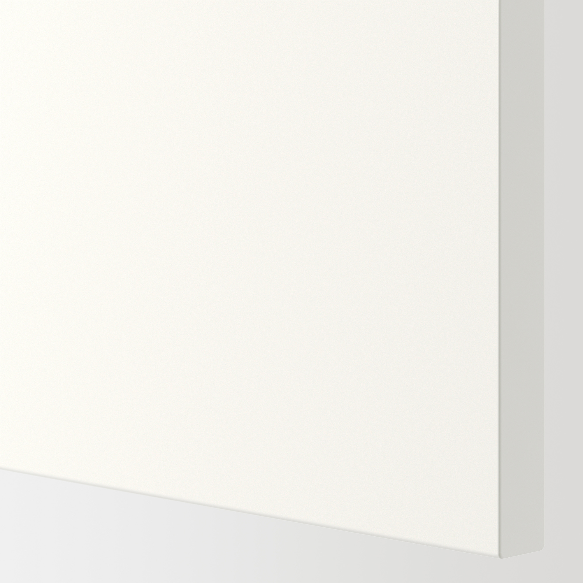 Crisp white ENHET cabinet with integrated oven space, sleek drawer, robust build.