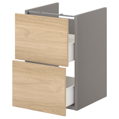 Wood-like ENHET bathroom cabinet with 2 drawers, light oak, grey frame.