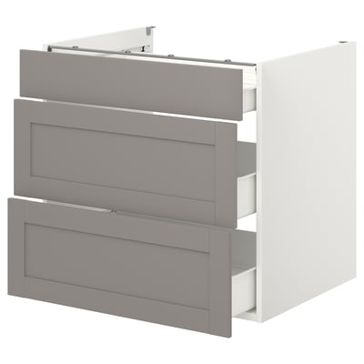 An ENHET cabinet with three grey drawers, a modern kitchen storage solution with a minimalist design and steel drawers.