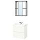 Option: Modern bathroom setup featuring ENHET white vanity with two drawers, chrome faucet, a black-framed mirror, and a stylish container.