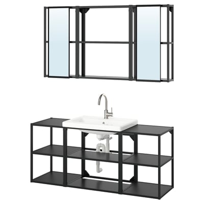 Modern bathroom setup, featuring ENHET black metal shelf with white sink and mirror, sleek and minimalist design.