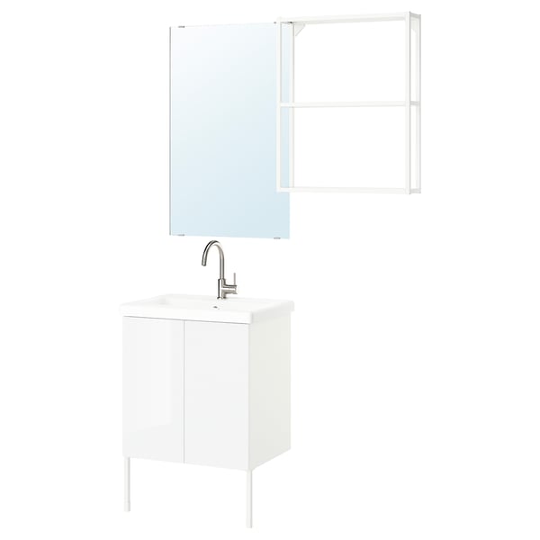 Modern white bathroom setup: sleek sink cabinet, mirror, and wall shelves with chrome fixtures.
