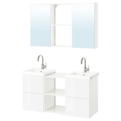Modern white bathroom vanity: double sinks, chrome faucets, mirrored cabinets. Symmetrical design with mix of open and closed storage.