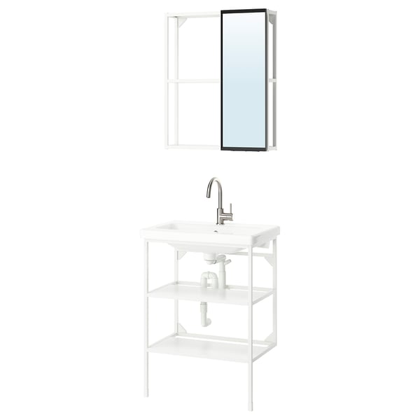 White bathroom setup: wall-mirror, metal frame; open shelf unit; single vanity with silver faucet.