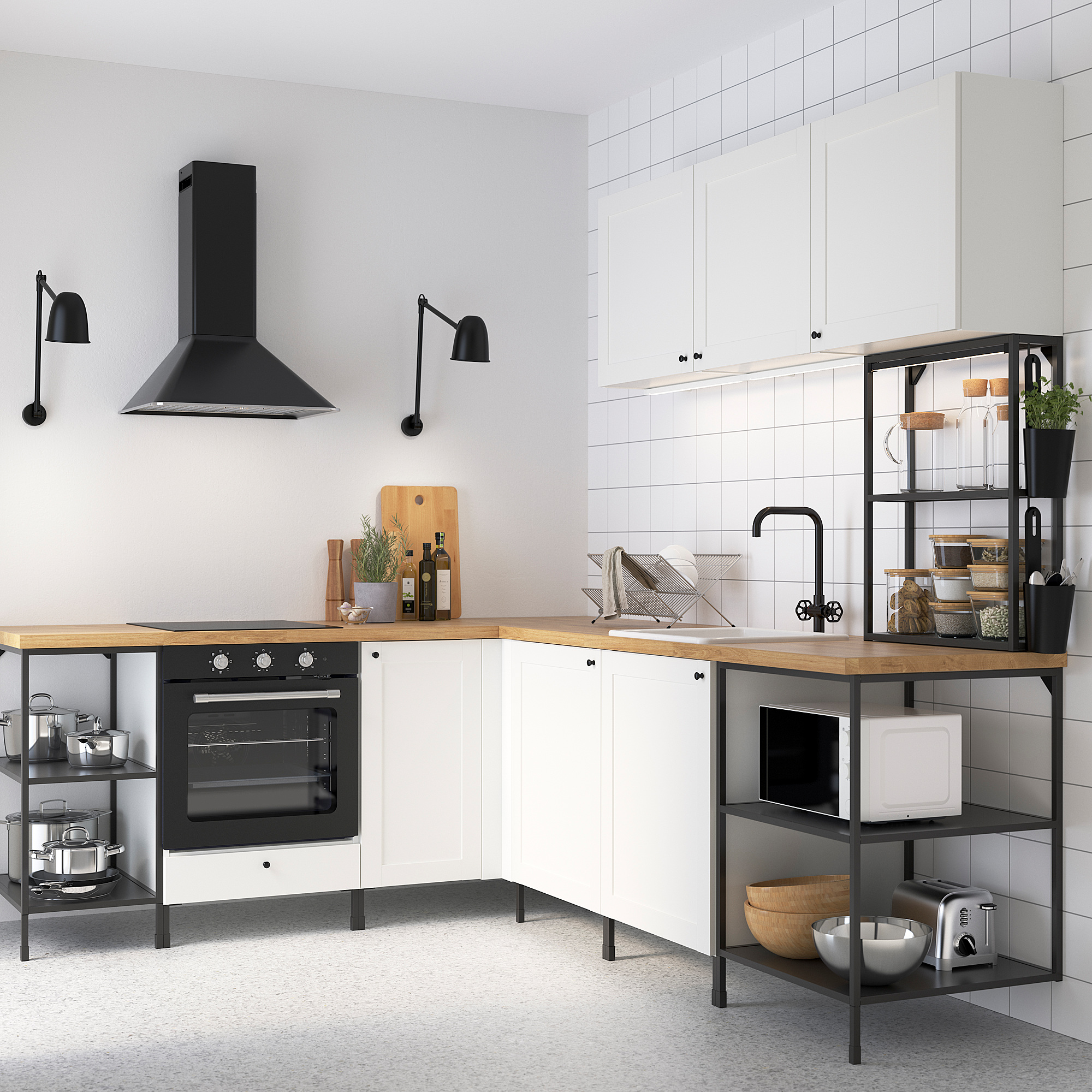 Modern white ENHET kitchen with black details: sleek cabinets, black oven, sink faucet.