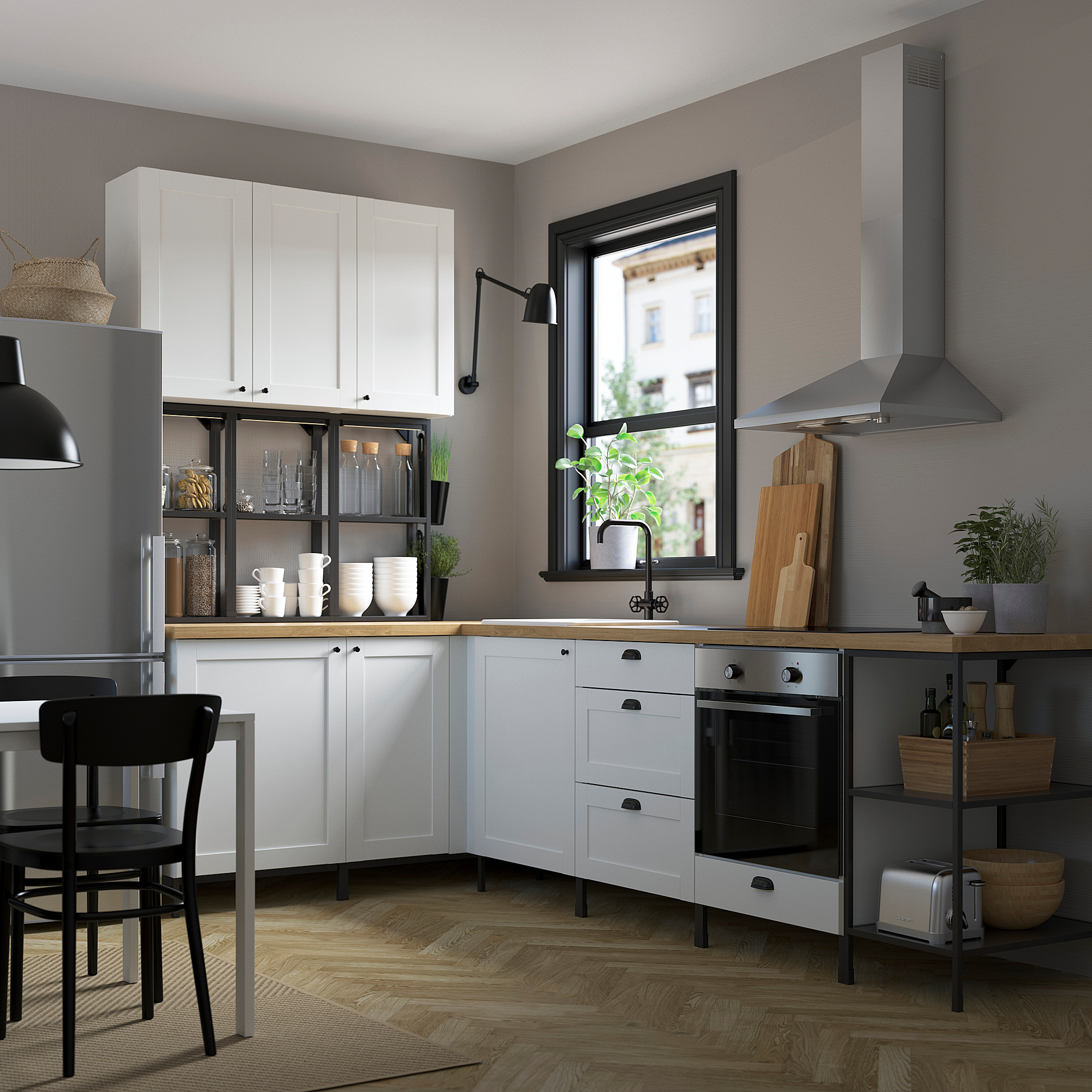 Modern kitchen with white ENHET cabinets, clean lines, and stainless steel appliances, generating a spacious, organized culinary space.