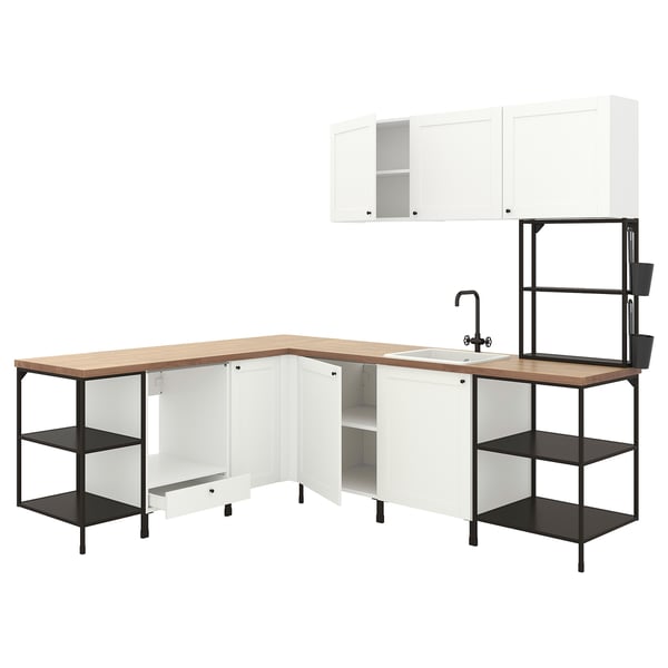 Modern white kitchen with l-shape, wooden counter, open shelves, and wall cabinets.