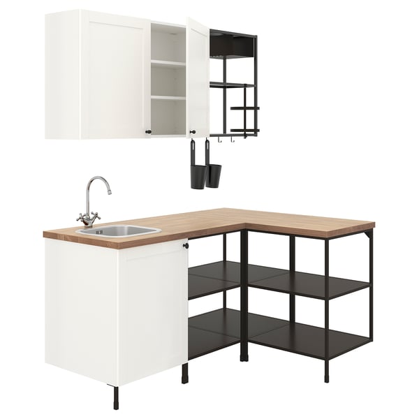 White modular kitchen set with light wood countertop, including sink, faucet, and storage units.