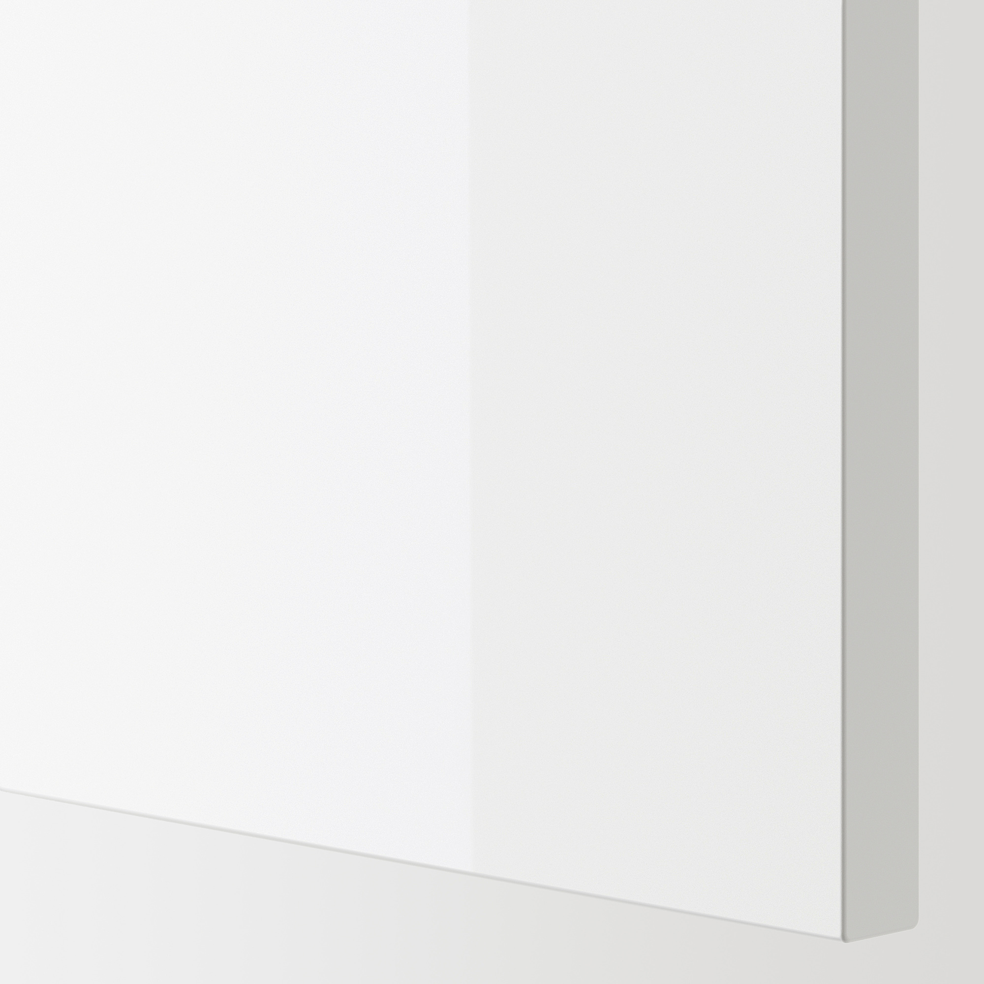 Sleek, white glossy cabinet with smooth edges, reflecting light, modern and minimalist design.