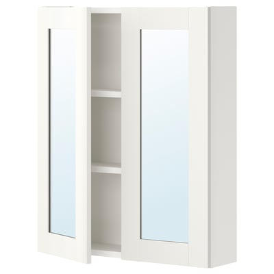 White ENHET wall cabinet with mirror doors and two shelves for bathroom storage.