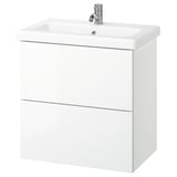White, wall-mounted bathroom vanity with two drawers and a ceramic sink, modern and minimalist design.