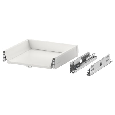 A white handleless drawer with metal runners.