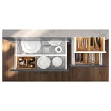 Modern kitchen drawer set with white finish, wooden inner boxes, metal utensils, and plates. Push-to-open system.