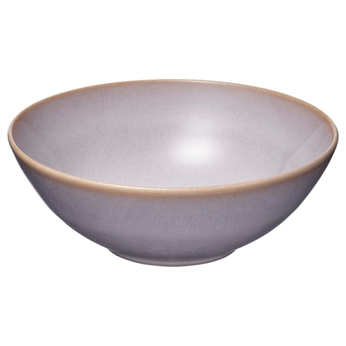Lavender stoneware bowl, rustic texture.