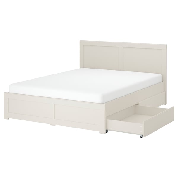 FÅGELFJÄLLET white bed with panel design, featuring two drawers on castors for storage.