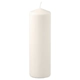 White FENOMEN candle, cylindrical shape, made of plant-based wax and cotton wick.