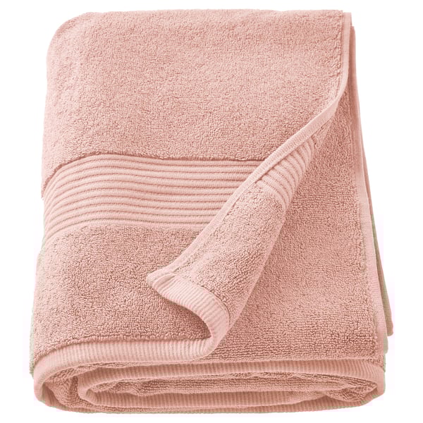 FREDRIKSJÖN light pink cotton towel, thick, soft, folded with ribbed edges.