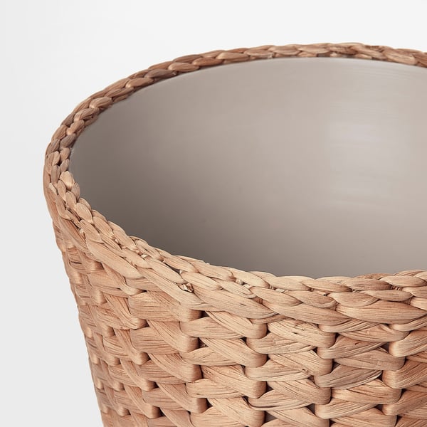 Wicker basket: handwoven water hyacinth, natural texture, stylish design.