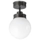 The FRIHULT lamp, matte black, a spherical glass shade and sleek metal base, creating a vintage yet modern design ideal for lighting and ambiance.