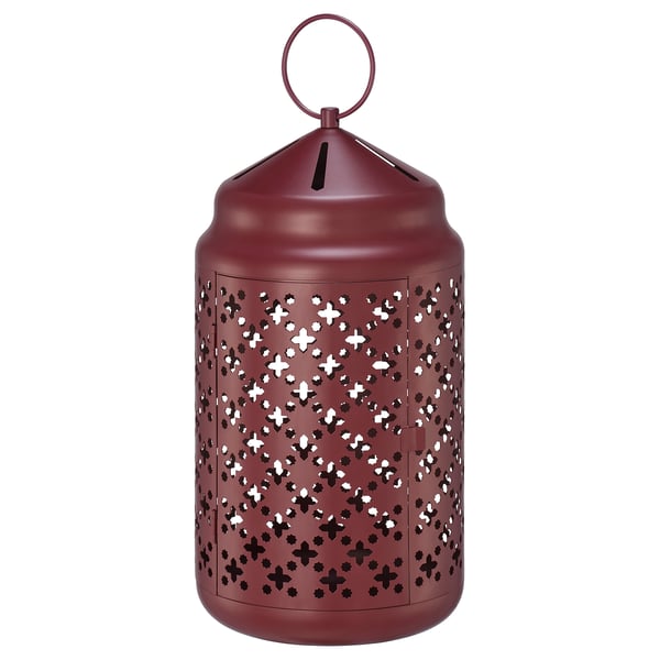 A red GOKVÄLLÅ lantern with a circular handle, cylindrical shape, and intricate cut-out designs, made of polyester powder-coated metal and steel.