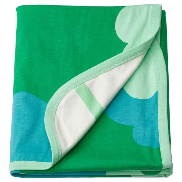 Greenfink baby blanket, green and blue, folded squarish, soft cotton, tree patterns.