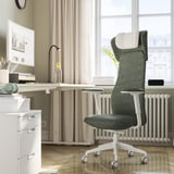 Modern ergonomic office chair in green fabric and white frame; eco-friendly, comfortable design.