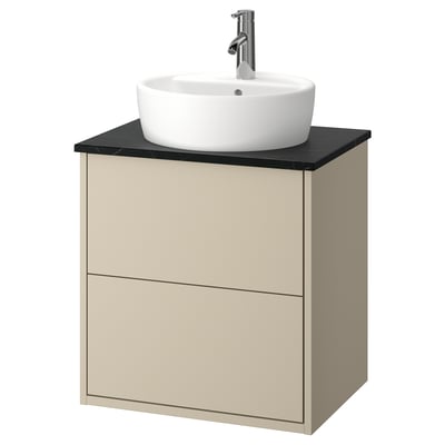 HAVBÄCK beige wall-mounted washstand with round white basil & dark countertop.