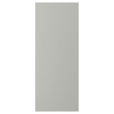 A light grey HAVSTORP kitchen cabinet door with a smooth, rectangular design made from acrylic paint and fibreboard.